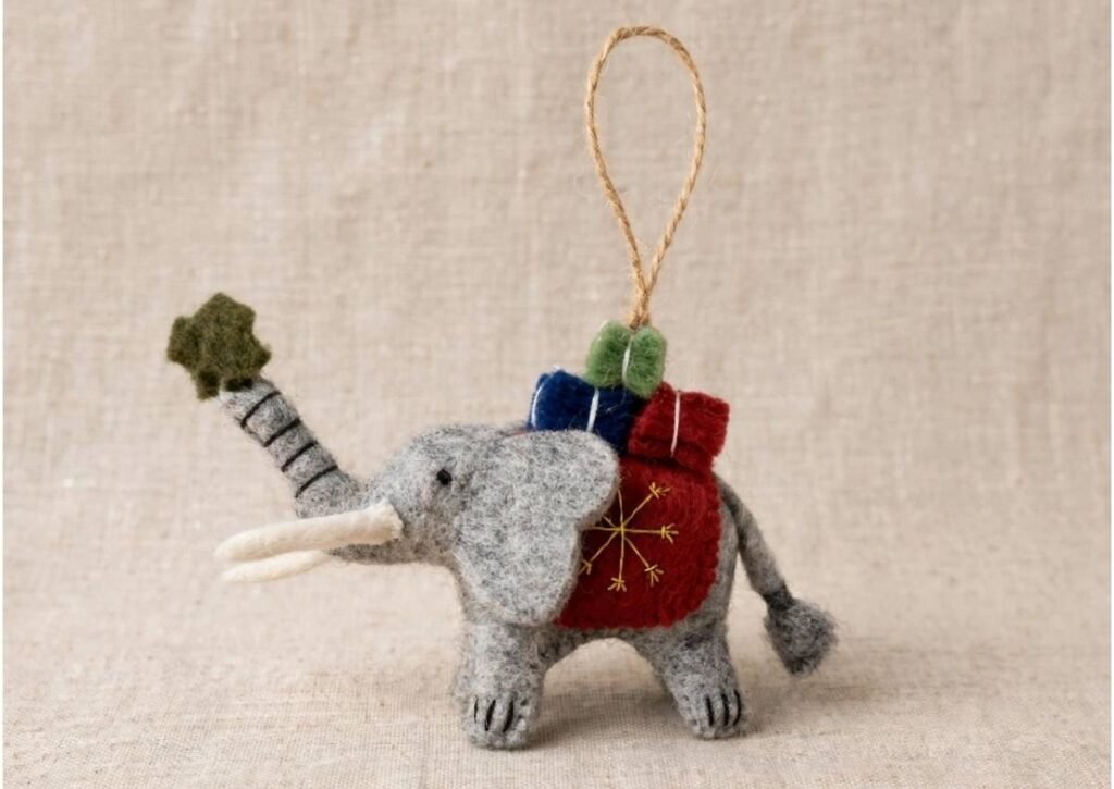Wholesale handmade needle felted elephant Christmas ornament from Nepal carrying gifts with star - Hillyarn